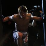 mma fighter entering the cage, try this weightless mma workout